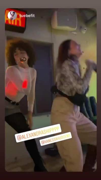 Vanessa Hudgens dancing at a bar