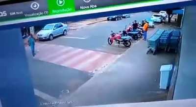 Man is caught in the middle of a street race