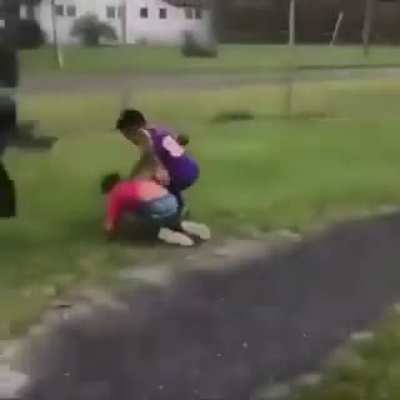 Three boys stomp a kid's head in while beating him, steal his bike and run him over with it while he tries to run away. As an adult male records the whole situation laughing.