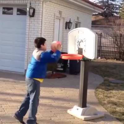 It's not the hoop's fault kid, it even tried to make it easy!