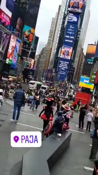 He's working hard to welcome the tourists back to Times Square