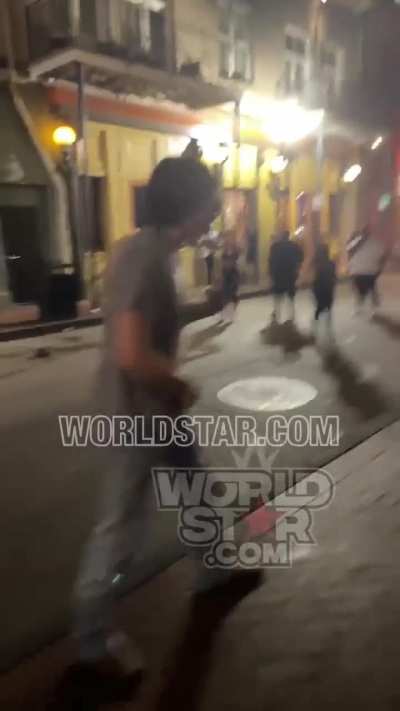 Brawl goes down on Bourbon St. In New Orleans.. Man fights with his hands while having gun on his waist