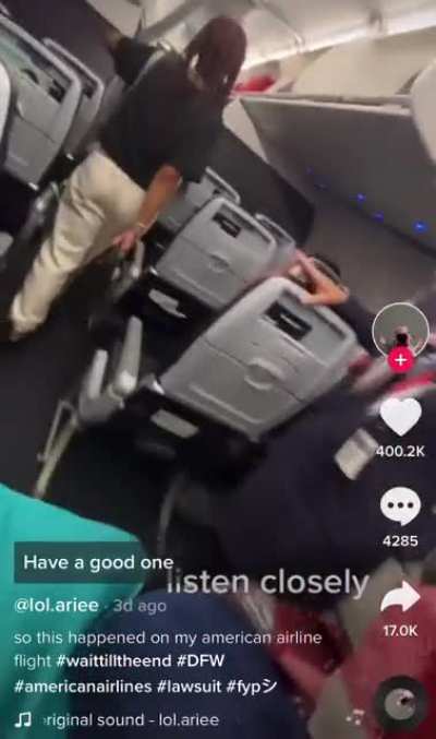 American Airlines flight crew duct taped a woman to her seat to stop her from trying to open the plane door while in flight