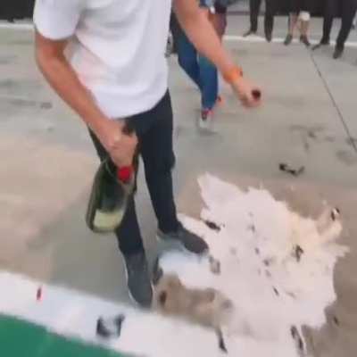 Lando Norris dies slightly while celebrating.