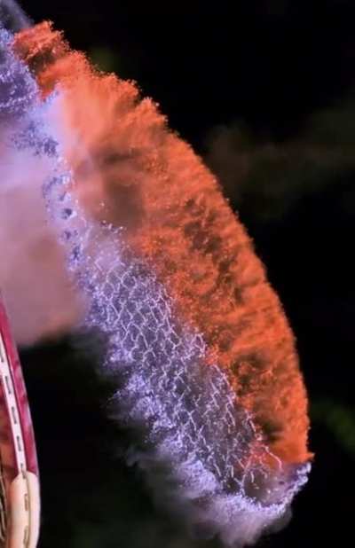 Powder on a racket frozen in time.