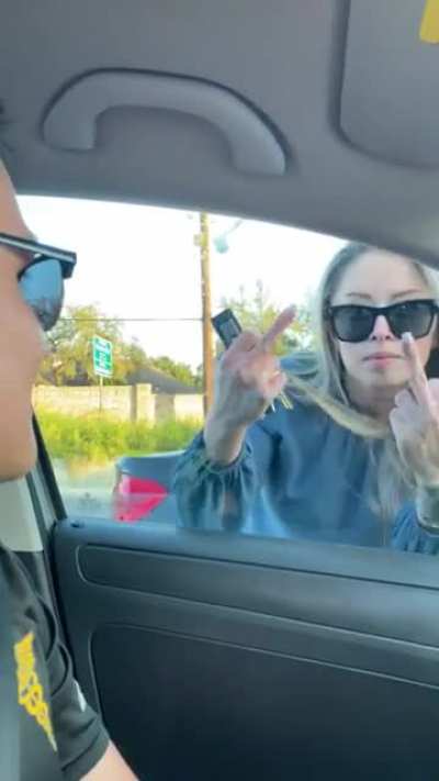 This lady got pissed because I honked when she almost hit my car, proceeded to brake check me 3 times, cut me off sideways, spit on my car, and do this…