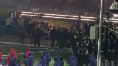 A background dancer unfurled a Palestinian & Sudanese flag while performing in the Super Bowl Halftime Show before being tackled by security & escorted off the field.