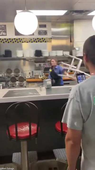 To throw a chair at someone