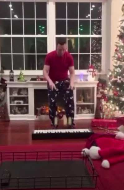 Man plays piano with ping-pong balls