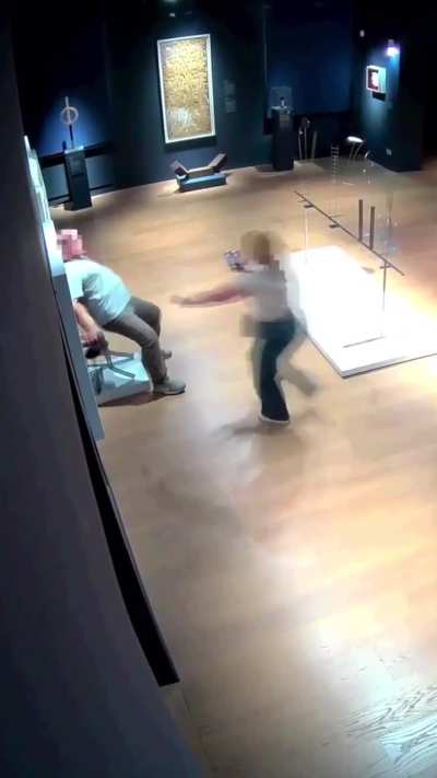 Person ruins art display by sitting on it