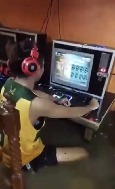 Kids continue to game during a flood