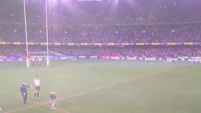 Foley ignoring the ref (time-off not called yet) and kicking quickly