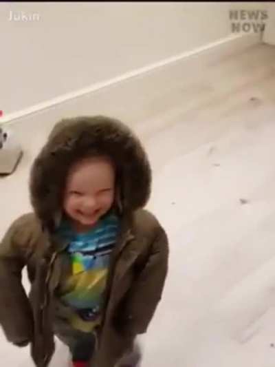 The way this kid puts on his jacket