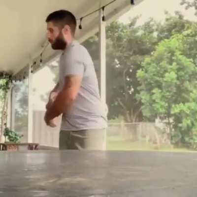 How is he training squirrels to dance along with him?