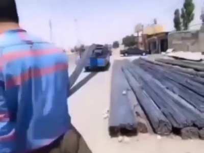 WCGW standing on the metal bars while unloading
