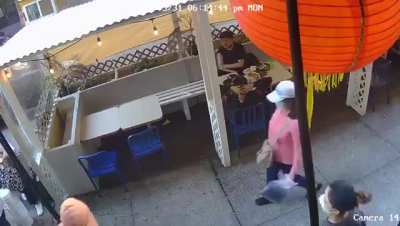 A man randomly knocking out a Chinese woman in Chinatown, Manhattan.