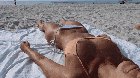 On the beach, down the bikini (f)