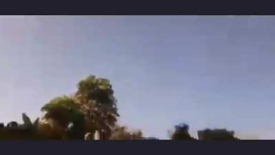 Watch an Israeli say he is happy because today is a holiday and there are no schools then a rocket landed near him