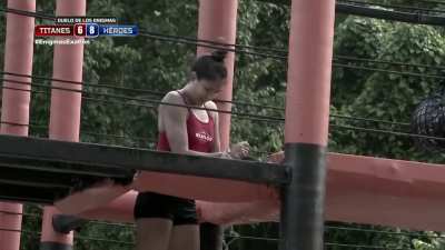 During an event, a competitor sets her dislocated shoulder back in place