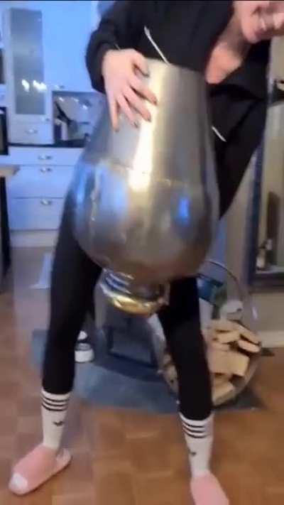 Try to get something out of the large vase