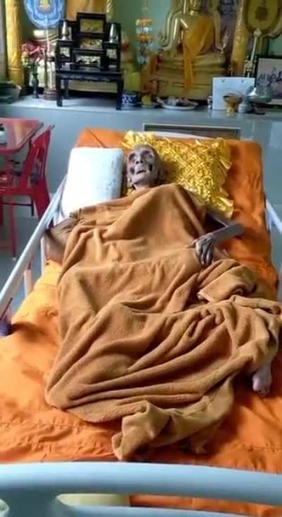 109 years old monk