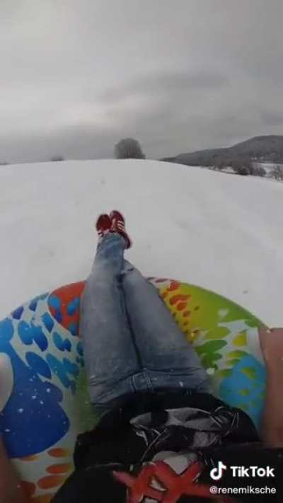 Backyard Snow Slide in Austria POV
