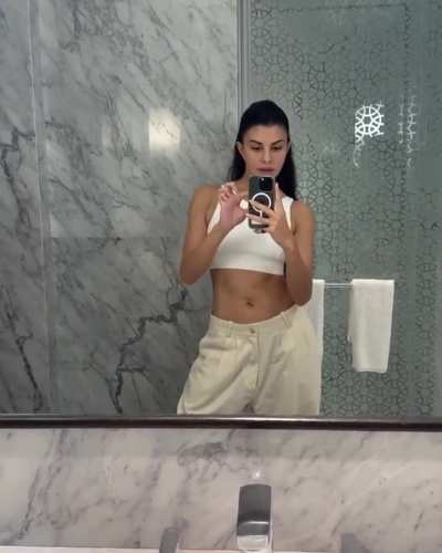 Flaunting her Abs