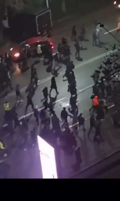 Protesters in Kazakhstan attacking APC