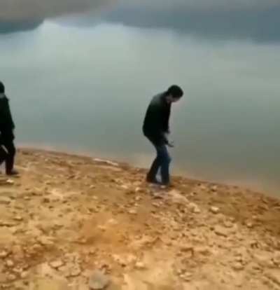 WCGW throwing rocks to the water