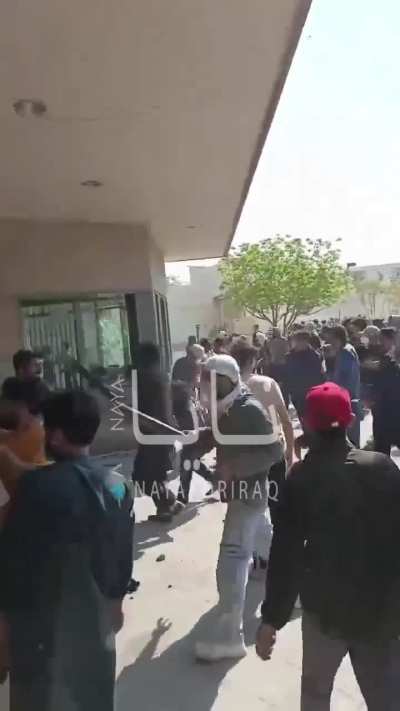 Protestors storming the American US Consulate in Karachi, Pakistan.