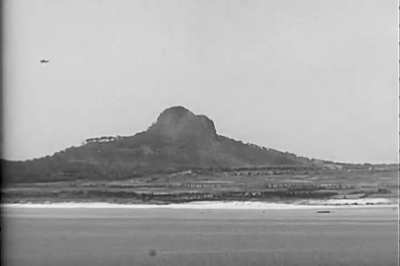 American planes bombing targets on Iejima Island, Okinawa, Japan. April 1945.