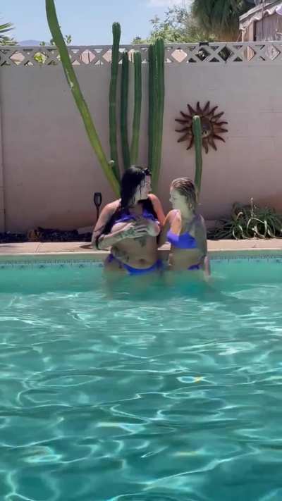 Love fondling her wet tits in the pool 