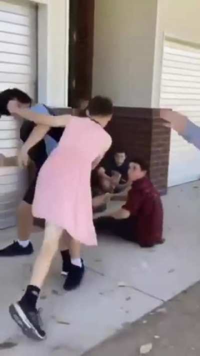 kid in a pink dress beefs with another kid at school