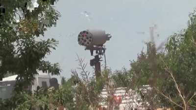 Opposition fighters target SAA positions with a cannibalized helicopter rocket pod mounted to a converted truck - al-Talisiyah - 2013