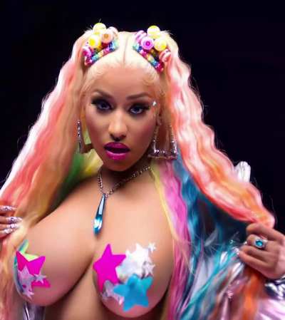Nicki Minaj teasing her boobs