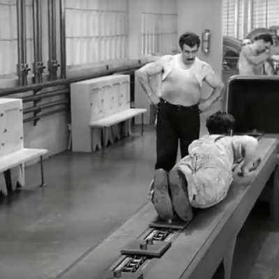 Charlie Chaplin Swallowed by a Factory Machine 1936.