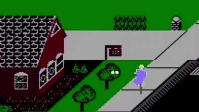 Trying to throw a newspaper into a mailbox in Paperboy for the NES