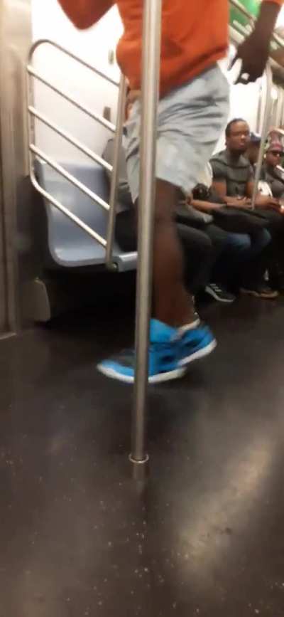 MC On The Train Hurts His Foot Trying to Put On A Show
