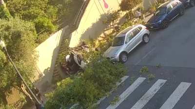 Two-angle video of the car careening over Sanchez stairs