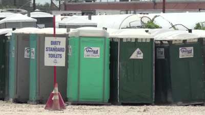 A portapotty slide show, with Scatman John's Scatmusic in the background