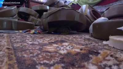 UA POV: Ukrainian soldier demonstrates defusing a grenade placed under a mine in a residential building.