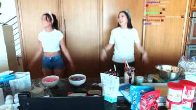 Leslie does jumping jacks with her assistant Emily