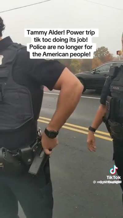 A power tripping police woman goes off on civilians and starts arresting everyone in sight
