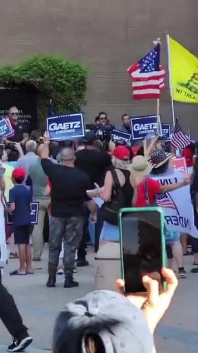 Crowd of protesters chanting “pedophile” at Matt Gaetz