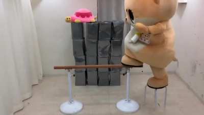To walk across a wooden rail whilst wearing a Chiitan suit