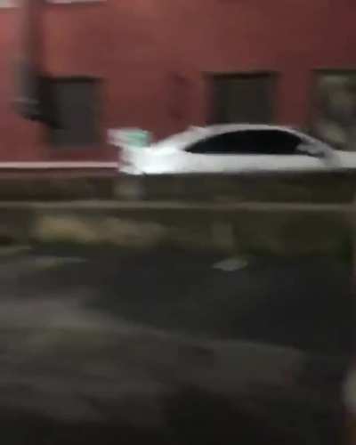 Raleigh NC Police firing at a business owner handing out water on the sidewalk.