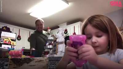 Dad hysterically dances as daughter does arts and crafts for virtual school