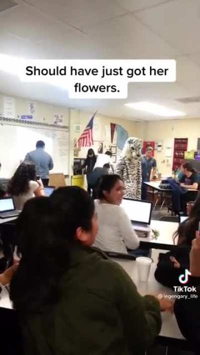 Asking a girl to prom in a tiger fur suit