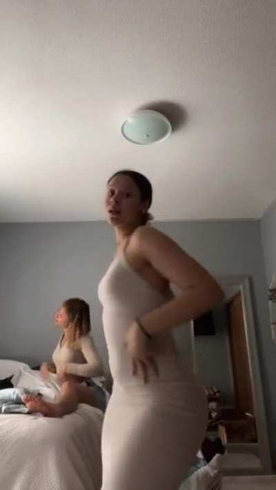 Ana in tan dress