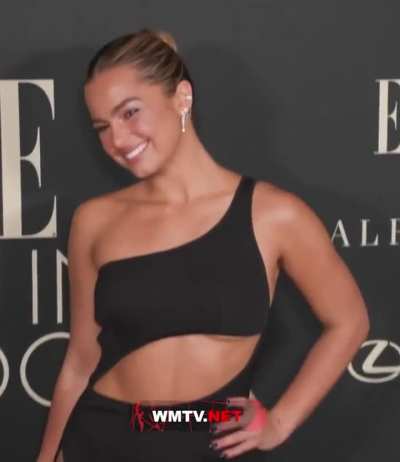 Addison Rae in a black dress